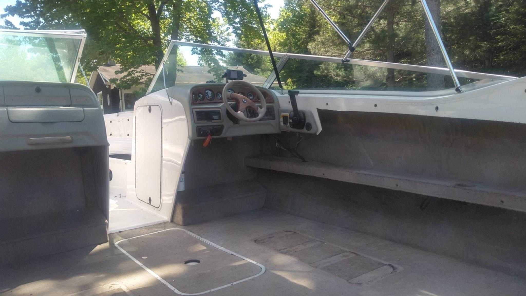 Worn boat cockpit seating before the marine interior restoration