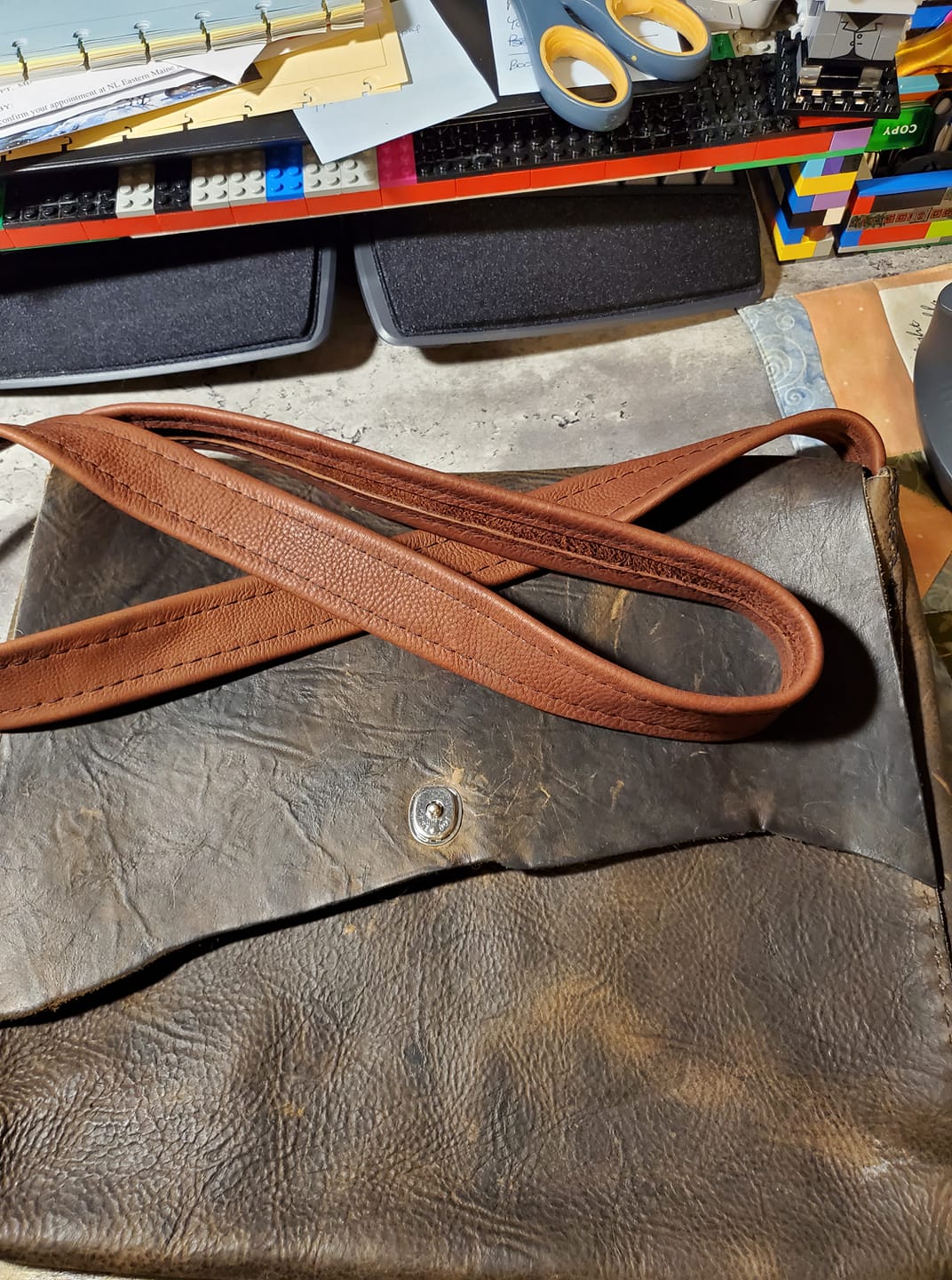 Handmade leather bag with new custom strap repair